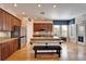 Island kitchen with granite countertops and stainless steel appliances at 5614 Seagrass Pl, Apollo Beach, FL 33572