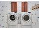 Bright laundry room with washer and dryer at 5614 Seagrass Pl, Apollo Beach, FL 33572