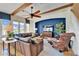 Spacious living room with hardwood floors and exposed beams at 5614 Seagrass Pl, Apollo Beach, FL 33572
