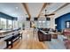 Spacious living room with hardwood floors and exposed beams at 5614 Seagrass Pl, Apollo Beach, FL 33572