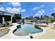 Relaxing freeform pool with a spa and patio area at 5614 Seagrass Pl, Apollo Beach, FL 33572