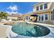 Inviting freeform pool with spa and ample deck space at 5614 Seagrass Pl, Apollo Beach, FL 33572