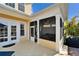 Spacious screened porch with access to the pool area at 5614 Seagrass Pl, Apollo Beach, FL 33572