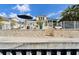 Property features a concrete seawall and walkway at 5614 Seagrass Pl, Apollo Beach, FL 33572
