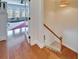Hardwood staircase leading to upper level at 5614 Seagrass Pl, Apollo Beach, FL 33572