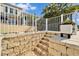Steps leading down to the backyard and waterfront at 5614 Seagrass Pl, Apollo Beach, FL 33572