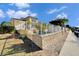 Home's exterior boasts a waterfront view and seawall at 5614 Seagrass Pl, Apollo Beach, FL 33572
