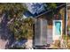 Aerial view showing house, pool, and surrounding landscape at 8462 8Th N Way, St Petersburg, FL 33702