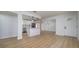 Modern kitchen with white cabinets, quartz countertops, and stainless steel appliances at 8462 8Th N Way, St Petersburg, FL 33702