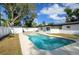 Inviting pool area, spacious backyard, and detached shed at 8462 8Th N Way, St Petersburg, FL 33702
