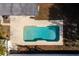 Overhead view of refreshing blue rectangular pool at 8462 8Th N Way, St Petersburg, FL 33702