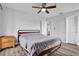 Bright bedroom with a double bed and ceiling fan at 10265 Gandy N Blvd # 1507, St Petersburg, FL 33702
