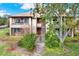 Two-story condo building with private entrance and landscaping at 10265 Gandy N Blvd # 1507, St Petersburg, FL 33702