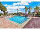 Community pool with plenty of lounge chairs at 10265 Gandy N Blvd # 1507, St Petersburg, FL 33702