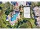 Community pool, spa, and sand volleyball court at 10265 Gandy N Blvd # 1507, St Petersburg, FL 33702