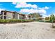 Community volleyball court with building in background at 10265 Gandy N Blvd # 1507, St Petersburg, FL 33702
