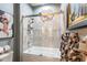 Bathroom with a shower/tub combo and stylish decor at 10338 Highland Park Pl, Palmetto, FL 34221