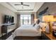 Bright bedroom with large windows and water view at 10338 Highland Park Pl, Palmetto, FL 34221