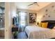 Guest bedroom with ensuite bathroom access at 10338 Highland Park Pl, Palmetto, FL 34221
