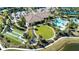 Community features bocce ball, fire pit, and resort-style pool at 10338 Highland Park Pl, Palmetto, FL 34221