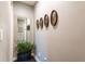 Hallway with mirror and wall decor at 10338 Highland Park Pl, Palmetto, FL 34221