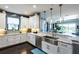 Modern kitchen with stainless steel appliances and granite countertops at 10338 Highland Park Pl, Palmetto, FL 34221
