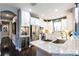 Modern kitchen with stainless steel appliances and granite countertops at 10338 Highland Park Pl, Palmetto, FL 34221