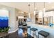 Modern kitchen with stainless steel appliances and an island at 10338 Highland Park Pl, Palmetto, FL 34221