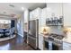 Modern kitchen with stainless steel appliances and granite countertops at 10338 Highland Park Pl, Palmetto, FL 34221