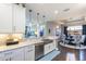 Modern kitchen with stainless steel appliances and granite countertops at 10338 Highland Park Pl, Palmetto, FL 34221
