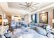 Spacious living area with a view into the kitchen area at 10338 Highland Park Pl, Palmetto, FL 34221