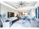 Living room with hardwood floors and modern decor at 10338 Highland Park Pl, Palmetto, FL 34221