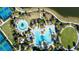 Resort-style pool with surrounding lounge chairs and landscaping at 10338 Highland Park Pl, Palmetto, FL 34221