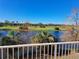 Scenic backyard view overlooking a peaceful lake and golf course at 1200 Country Club Dr # 1103, Largo, FL 33771