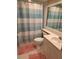 Clean bathroom with shower/tub and updated vanity at 1200 Country Club Dr # 1103, Largo, FL 33771