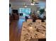 Modern kitchen with granite countertops and a large island at 1200 Country Club Dr # 1103, Largo, FL 33771