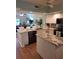 Spacious kitchen with granite countertops and stainless steel appliances at 1200 Country Club Dr # 1103, Largo, FL 33771