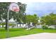 Outdoor basketball court near waterfront at 123 9Th St, Belleair Beach, FL 33786