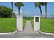 White columns and pathway lead to beach access at 123 9Th St, Belleair Beach, FL 33786