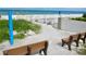 Beach access with benches and outdoor shower at 123 9Th St, Belleair Beach, FL 33786