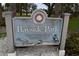 Bayside Park sign with funding information at 123 9Th St, Belleair Beach, FL 33786