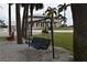 Relaxing swinging bench near a community building at 123 9Th St, Belleair Beach, FL 33786