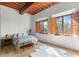 Bedroom with wooden floors and large windows at 1571 Oceanview Dr, St Petersburg, FL 33715