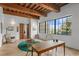 Home office features wood floors, large windows, and a view at 1571 Oceanview Dr, St Petersburg, FL 33715