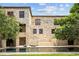 Stone house exterior with pool and landscaping at 1571 Oceanview Dr, St Petersburg, FL 33715