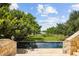 View from the pool area to the water at 1571 Oceanview Dr, St Petersburg, FL 33715
