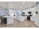 Spacious kitchen with white cabinets and island at 17671 Bright Wheat Dr, Lithia, FL 33547