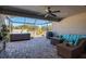 Spacious patio with hot tub, seating area, and grill at 17671 Bright Wheat Dr, Lithia, FL 33547