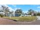 Charming bungalow with a manicured lawn and brick-paved street at 1922 55Th S St, Gulfport, FL 33707