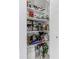 Well-organized pantry with ample shelving for storage at 1922 55Th S St, Gulfport, FL 33707